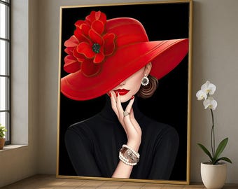 May include: A framed artwork featuring a woman in a red hat with a large flower, red lipstick, and a black turtleneck. The woman's hand is adorned with rings and a bracelet. The background is black, and the frame is gold.