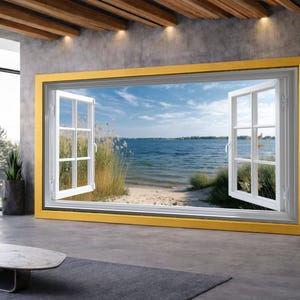 Puede incluir: Una ventana grande con marco amarillo, que revela una vista panorámica de una playa y un lago bajo un cielo azul. La ventana está abierta, con marcos y cristales blancos. El interior presenta un diseño moderno con suelo y paredes grises.