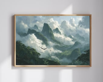 Op de afbeelding: Een ingelijste landschapsprint aan de muur met een weelderig groen gebergte dat gedeeltelijk wordt bedekt door dikke witte wolken en mist. Verschillende donkere vogels vliegen door de lucht tussen de grillige, begroeide bergtoppen.
