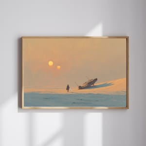 Puede incluir: Una impresión enmarcada representa un paisaje desolado bajo un cielo cálido y anaranjado con dos soles. Una figura se encuentra cerca de una nave espacial estrellada en una duna de arena. La obra evoca una sensación de aislamiento y aventura, con un tema de ciencia ficción.