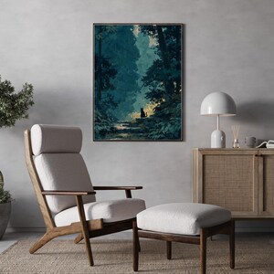 May include: A framed print shows a forest scene with a black cat on a stone path. The artwork hangs above a mid-century modern chair and ottoman set with light grey upholstery and a wooden frame. A white lamp and a wooden cabinet are also in the room.