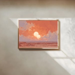 以下が含まれることがあります： 砂漠の風景に夕日が沈む様子を描いた額入りの風景画。空はオレンジとピンクの色合いで満たされ、2つの明るい太陽が描かれています。地平線には小さなヨットが見えます。絵は木製のフレームに入っています。