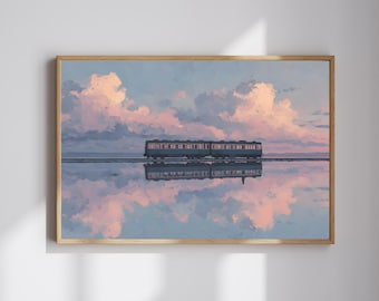 May include: A framed art print depicts a train traveling across a reflective surface, mirroring the sky above. The sky is filled with pink and blue clouds, creating a serene and dreamlike landscape. The train is a muted teal color.