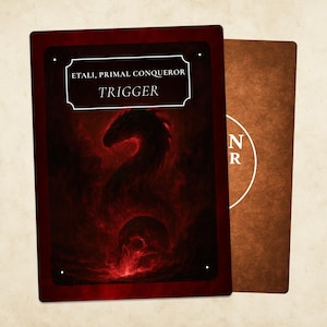 May include: Two trading cards. The front card is dark red with the text "ETALI, PRIMAL CONQUEROR TRIGGER" in white. A red dragon illustration is visible. The back card is brown with a white circular design.