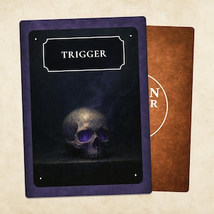 May include: Two tarot cards. The front card has a dark purple border and features a skull with glowing purple eyes and the word "TRIGGER" in a white box. The back card is brown with white text.