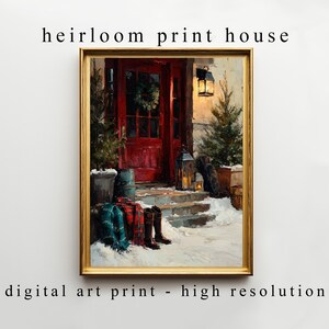 May include: A framed digital art print of a winter scene. The artwork depicts a red door with a wreath, snow-covered steps, and a lantern. The text "heirloom print house" and "digital art print - high resolution" are visible.