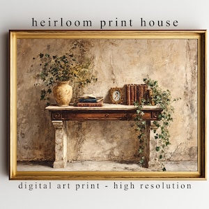 May include: A framed digital art print with a vintage aesthetic. The artwork depicts a table with a vase of flowers, books, and a framed portrait. The print has a gold frame and the text "heirloom print house" and "digital art print - high resolution".