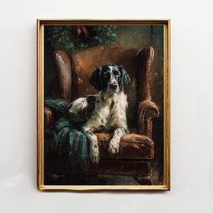 Puede incluir: Pintura enmarcada que representa un perro blanco y negro descansando en un sillón de cuero marrón. El perro está cubierto con una manta a cuadros verdes. La pintura tiene un marco dorado y una corona navideña en el fondo.