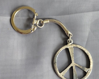Llavero vintage con el símbolo de la paz – Llavero hippie plateado estilo retro de los años 70, adorno para bolso de la contracultura