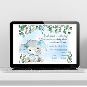 Blue elephant baby shower invitation shown on a laptop on top of white desk so you can see what the invitation looks like when sent as an e-vite.