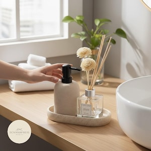 Juego de baño moderno con dispensador de jabón de resina: dispensador de jabón de cerámica y vasos para la decoración del baño.