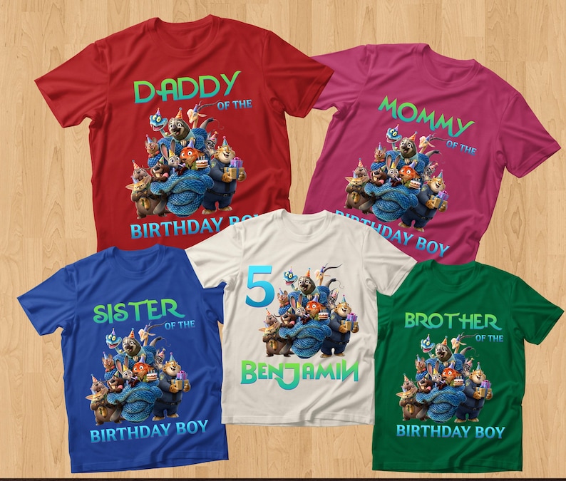 May include: Five colorful t-shirts with birthday-themed graphics. The shirts are red, pink, blue, white, and green. Each shirt has a cartoon graphic and text that reads "Daddy", "Mommy", "Sister", "5 Benjamin", and "Brother" with "Birthday Boy".
