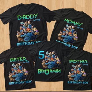 May include: Black t-shirts with birthday-themed graphics. The shirts feature text like "Daddy," "Mommy," "Sister," and "Brother" with a cartoon illustration. One shirt says "5 Benjamin" with a similar design.