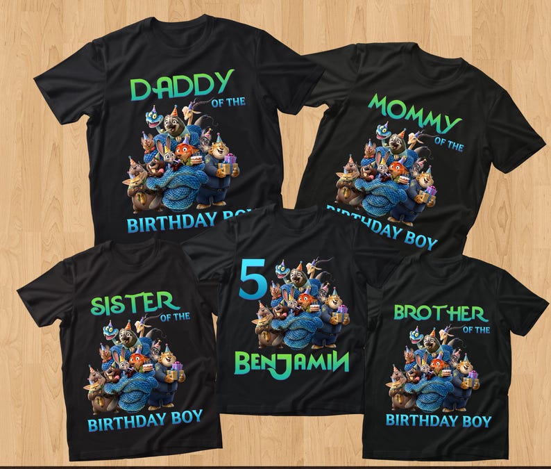 May include: Black t-shirts with birthday-themed graphics. The shirts feature text like "Daddy," "Mommy," "Sister," and "Brother" with a cartoon illustration. One shirt says "5 Benjamin" with a similar design.