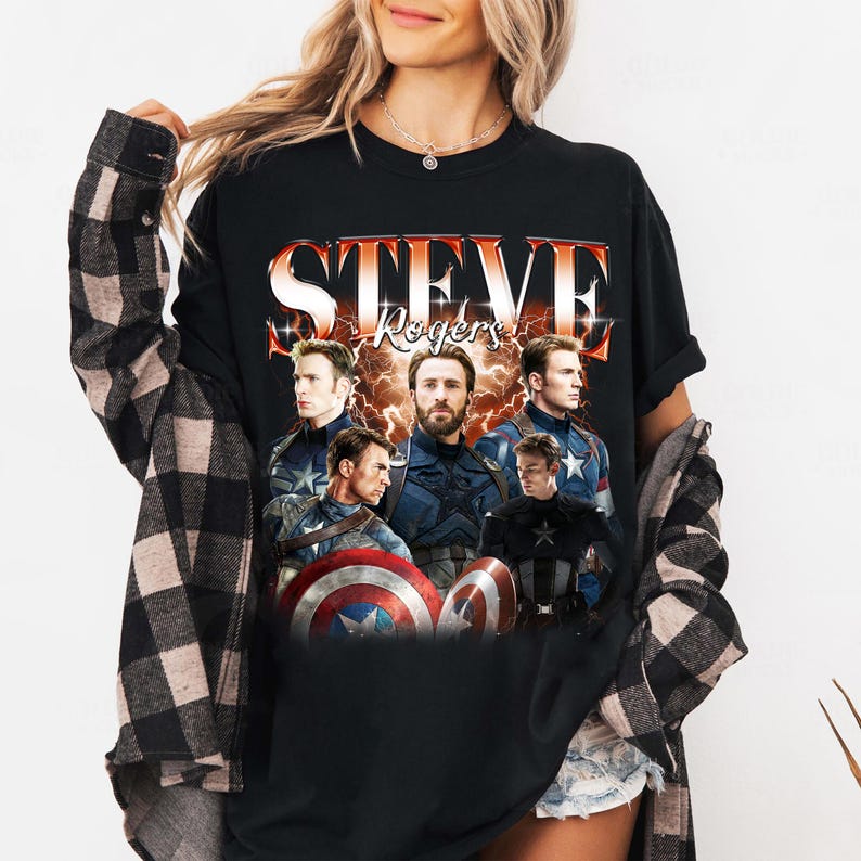 May include: Black t-shirt featuring a graphic of Steve Rogers, with the text "STEVE Rogers" in a stylized font. The graphic includes multiple images of the character in various poses, with a shield and lightning effects.