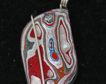 Fordite Pendant, Maroon white blue, silver Coiled bail 7ct; Fordite is dried paint from the plant spray paint booth