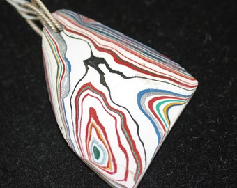 Fordite Pendant, red white black, "Striking Strong" silver Sparkle Coiled bail 32.5ct