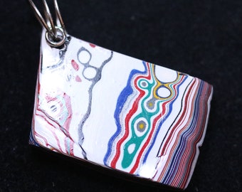 Fordite Pendant, white red dark blue dark green, silver-colored Coiled bail 49.5ct; Fordite is dried paint from the plant spray paint booth