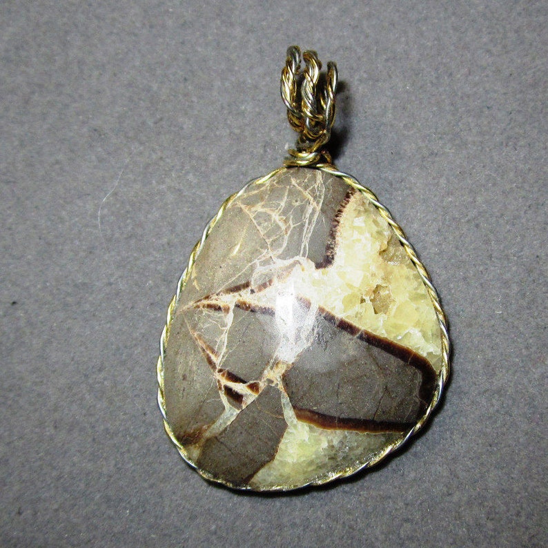 Mr Natural Septarian Concretion Pendant gold wire wrap bail 60ct Nose
