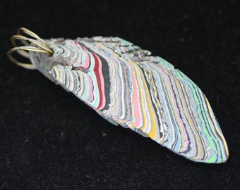 Fordite Pendant, blue gray white gold red pink, "Knife Blade", nickel Coiled bail 28.5ct