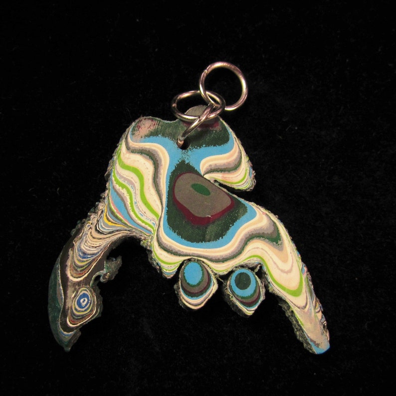 Fordite pendant silver jump bail 20ct; Fordite is dried paint from the plant spray paint booth yellow brown light blue red aqua