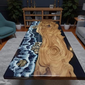 May include: A rectangular coffee table with a unique design. The table features a wooden surface with a natural grain pattern, combined with a blue epoxy resin that mimics ocean waves. The table also has embedded stones.