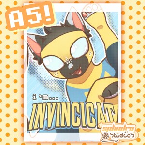 May include: A rectangular art print featuring a stylized anthropomorphic cat character with yellow and blue fur, wearing a mask. The text reads A5! at the top left, i'm... INVINCICAT in the center, and sphodro studios at the bottom right corner.