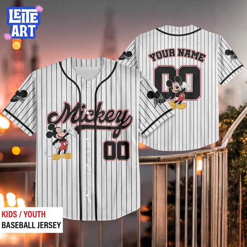 A white baseball jersey with Mickey Mouse printed on it, featuring the text " Mickey 00" and the number "00". The jersey appears to be personalized, with the name "YOUR NAME" and the number "00" printed on the back.