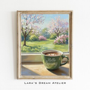 May include: A framed painting depicts a spring landscape with blooming trees and a green lawn. A green mug with "Hello Spring" is on a windowsill, filled with a warm beverage. The artwork has a warm, inviting feel.