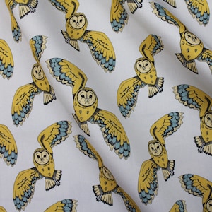 Owl upholstery fabric available by the metre.