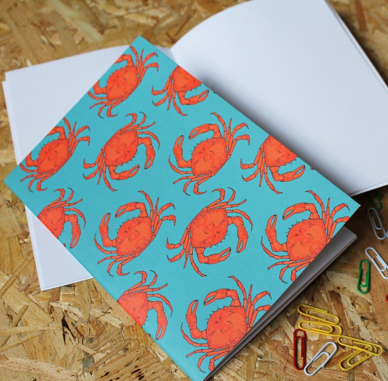 Crab A5 Notebook with 40 blank pages.