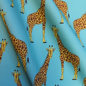 Giraffe upholstery fabric available by the metre.