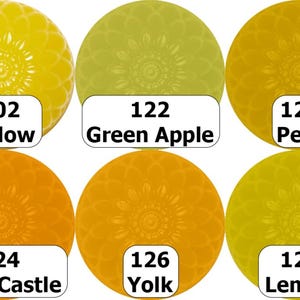 May include: A collection of six circular objects in shades of yellow and orange, each with a floral pattern. Each circle has a white label with a number and a color name: Yellow, Green Apple, Pear, Sand Castle, Yolk, and Lemon.