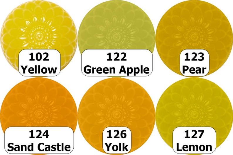 May include: A collection of six circular objects in shades of yellow and orange, each with a floral pattern. Each circle has a white label with a number and a color name: Yellow, Green Apple, Pear, Sand Castle, Yolk, and Lemon.