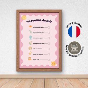 Op de afbeelding: Een ingelijste roze kaart met de titel "Ma routine du soir" met een houten frame. De kaart bevat geïllustreerde stappen voor een bedtijdroutine, zoals dineren, douchen en tandenpoetsen. Bevat een Franse vlag en een PDF-downloadpictogram.