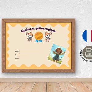 May include: A framed certificate with the text "Diplôme du plâtre Magique" and illustrations of deer and a gold medal. A small picture of a girl is on the certificate. The frame is brown, and the background is a light yellow colour.
