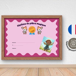 May include: A framed pink certificate with the text "Diplôme du plâtre Magique" and illustrations of deer and a gold medal. A small photo of a girl is attached. The frame is brown.