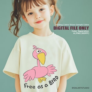 May include: A young person wearing a cream-colored t-shirt with a cartoon bird graphic. The bird is pink with a yellow beak and the text "Free as a Bird" is below the graphic. The image also includes the text "DIGITAL FILE ONLY".