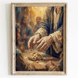 以下が含まれることがあります： 宗教的なシーンを描いた額入りのアートワーク。絵画は、テーブルの上のパンに向かって伸びる手を描いています。アートワークは、質感と細部に焦点を当て、暖かい色調で表現されています。