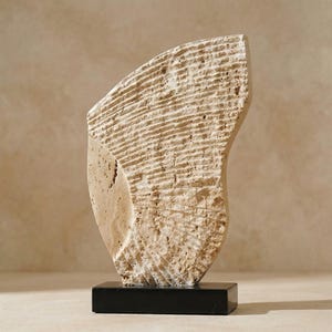 Hand-Carved Travertine Sculpture On Black Marble Base
