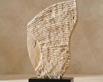 Hand-Carved Travertine Sculpture On Black Marble Base
