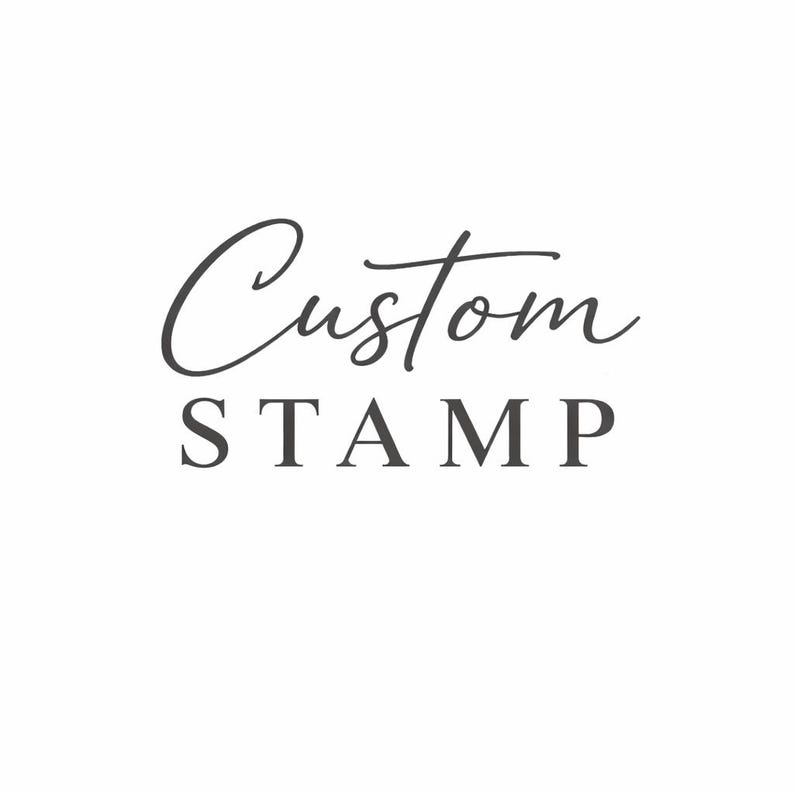 May include: A white background with the words "Custom STAMP" in dark gray. The word "Custom" is in a cursive font, while "STAMP" is in a serif font.