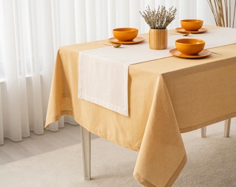 Neutraler Tischläufer aus cremefarbener Baumwolle für die Küche