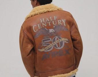 Chaqueta bomber de piel de oveja B-3 del 50.º aniversario de AVIREX: abrigo de vuelo unisex