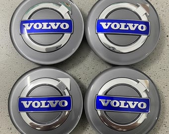 Coprimozzi per ruote Volvo, logo blu argento, 64 mm, (confezione da 4)