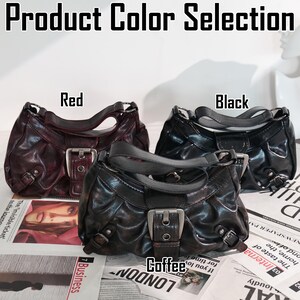 May include: An image showcasing three leather handbags in red, black, and coffee colors. Each bag features a top handle, a silver buckle, and decorative stitching. The text "Product Color Selection" is at the top.