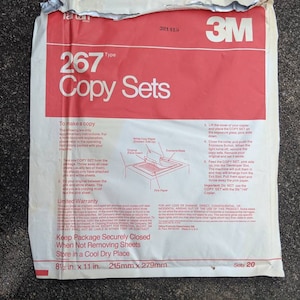 May include: A package of 3M 267 Copy Sets, with red and white text on a white background. The package includes instructions and a limited warranty. The dimensions are 8 1/2 in. x 11 in.