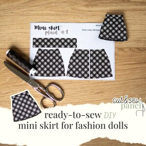 May include: A ready-to-sew DIY mini skirt panel for fashion dolls. The pattern includes pieces for a plaid mini skirt, with a spool of thread and scissors. The text on the pattern reads "Mini skirt Plaid #1" and "ready-to-sew DIY mini skirt for fashion dolls."