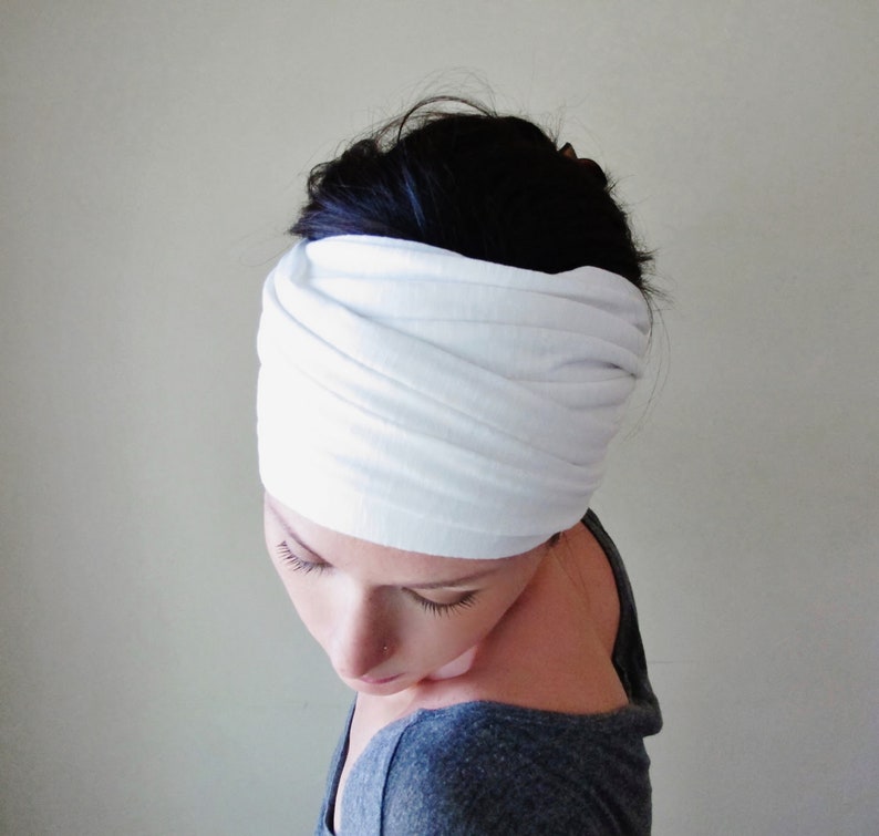 a handmade white jersey knit headscarf by the brand ecoshag