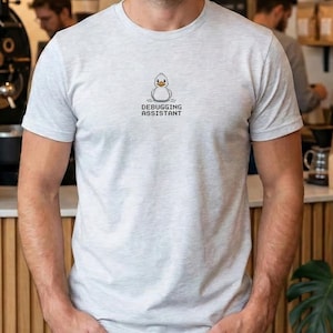 May include: A set of three ceramic nesting bowls in varying sizes. The bowls have a speckled, matte finish in cream, light blue, and grey. Each bowl has a rounded shape and a slightly flared rim. Ideal for food preparation and storage.